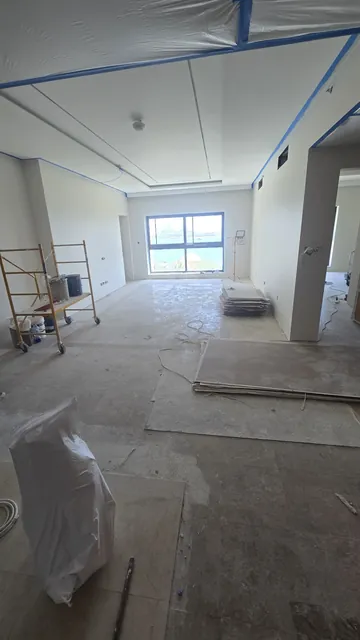 Suspended ceiling with light coves, taped and ready for finishing