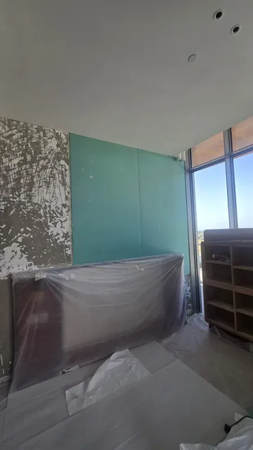 Drywall partitions and ceilings during an apartment renovation