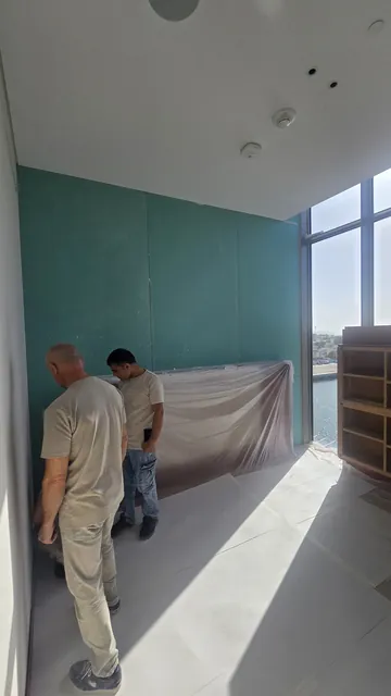 Drywall partitions and ceilings during an apartment renovation