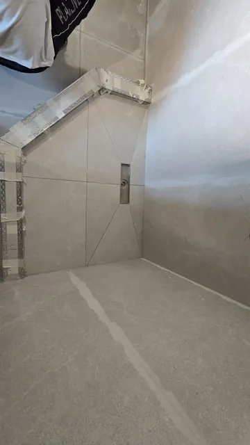 Room finished: painted walls, ceiling cove lighting and linear diffusers