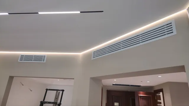 Room finished: painted walls, ceiling cove lighting and linear diffusers