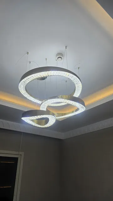 Chandelier installed on the finished ceiling
